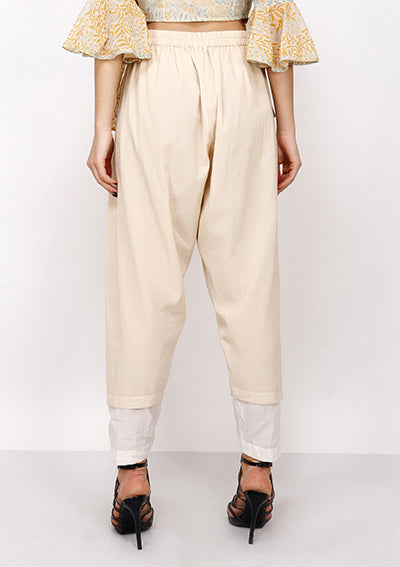 Beige pleated layered pants